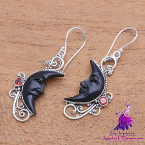 Hollowed Fashion Carved Gem Black Moon Earrings