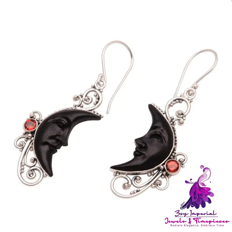 Hollowed Fashion Carved Gem Black Moon Earrings