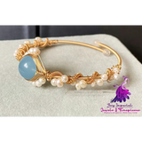 Gold-Wrapped Sapphire Pearl Bracelet