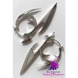 Darts Pointed Teeth Earrings