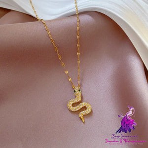 Small Snake Micro Gold Necklace with Green Eyes