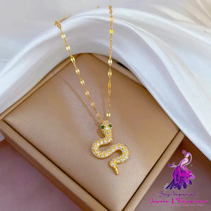 Small Snake Micro Gold Necklace with Green Eyes