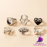 Exaggerated Heart Skull Ring