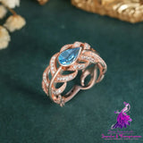 Swiss Blue Topaz Feather Ring