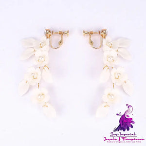 Handmade White Ceramic Flower Earpieces