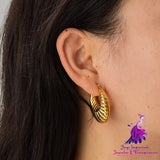 Exaggerated Horn Hollow Earrings