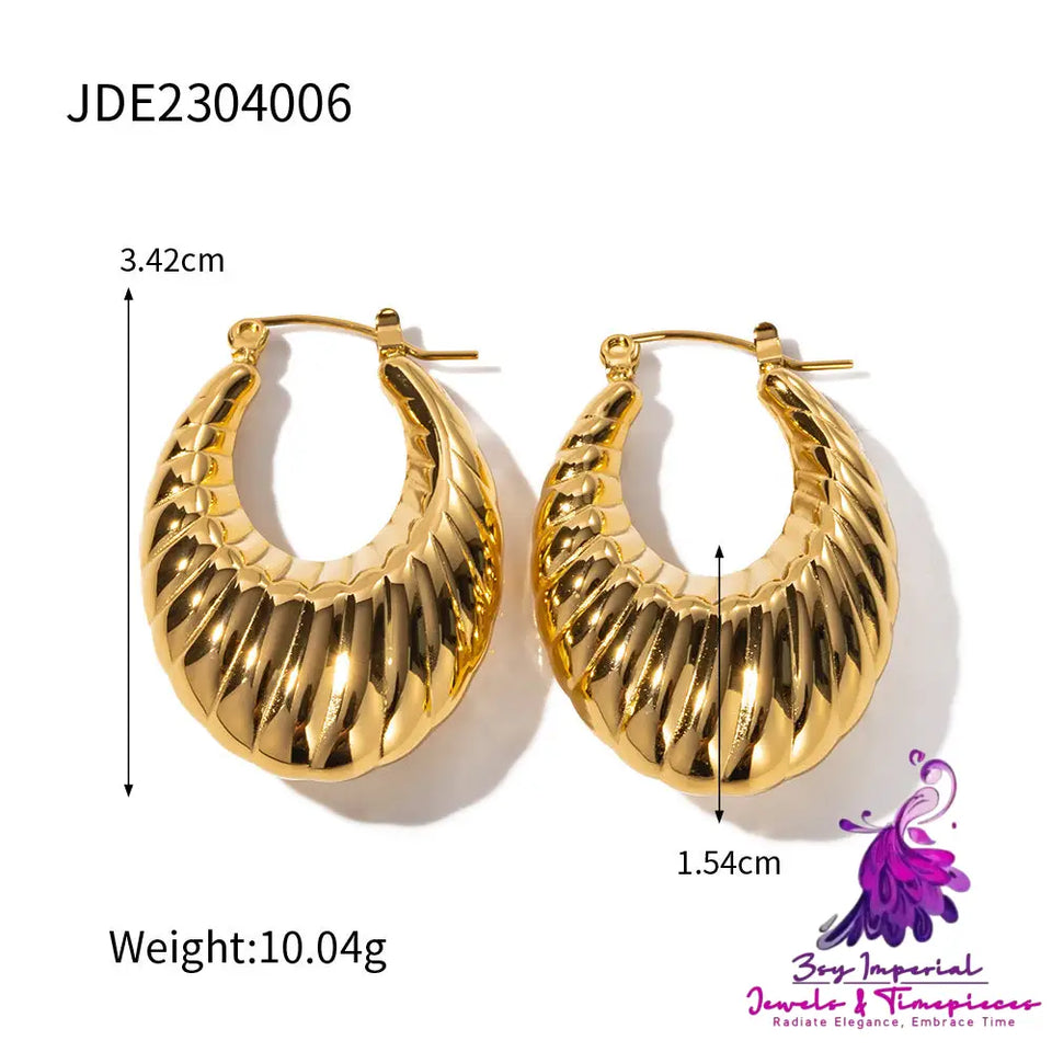 Exaggerated Horn Hollow Earrings