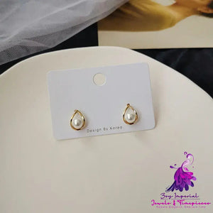 Oval Hollow Highlight Pearl Earrings